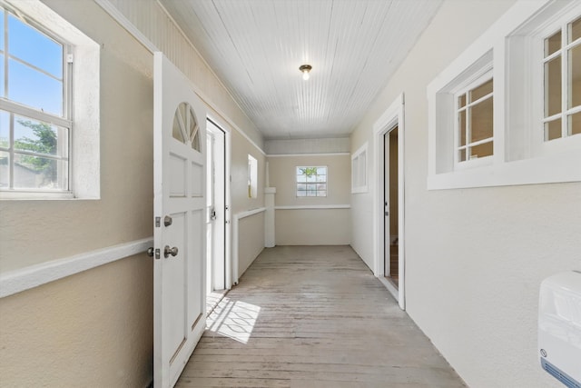 417 8th St NW, Albuquerque, NM 87102 - hallway featuring light wood-type flooring, wooden ceiling, and a textured wall