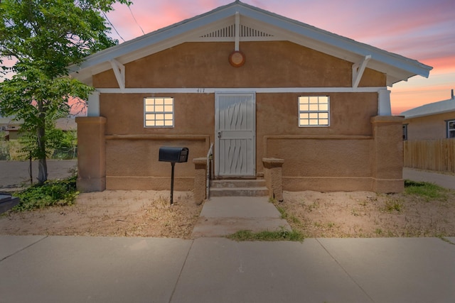 417 8th St NW, Albuquerque, NM 87102 - view of front facade featuring stucco siding