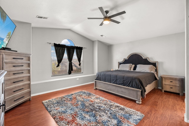 10119 Corral Gate Ln SW, Albuquerque, NM 87121 - bedroom featuring vaulted ceiling, wood finished floors, a ceiling fan, and baseboards