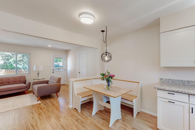 1825 Hiawatha Ct NE, Albuquerque, NM 87112 - dining space featuring light wood-style floors and baseboards
