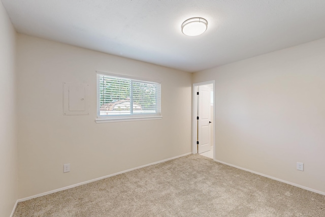 1825 Hiawatha Ct NE, Albuquerque, NM 87112 - carpeted spare room featuring baseboards and electric panel