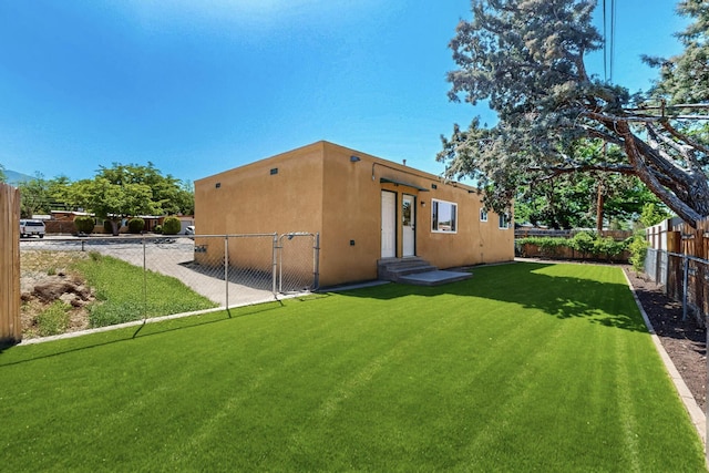 1825 Hiawatha Ct NE, Albuquerque, NM 87112 - rear view of house featuring stucco siding