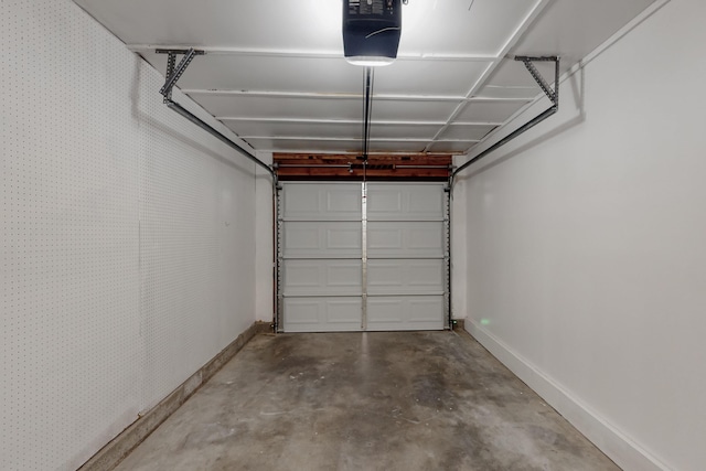 1825 Hiawatha Ct NE, Albuquerque, NM 87112 - garage featuring baseboards and a garage door opener