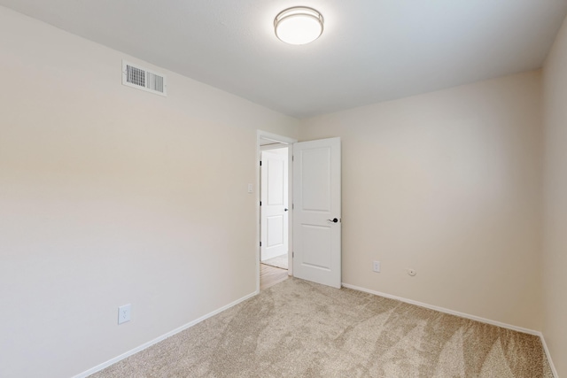1825 Hiawatha Ct NE, Albuquerque, NM 87112 - spare room featuring light carpet and baseboards