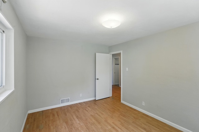 9722 Apache Ave NE, Albuquerque, NM 87112 - unfurnished room featuring light wood-style floors and baseboards