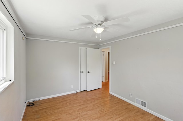 9722 Apache Ave NE, Albuquerque, NM 87112 - spare room featuring a ceiling fan, light wood-type flooring, and baseboards