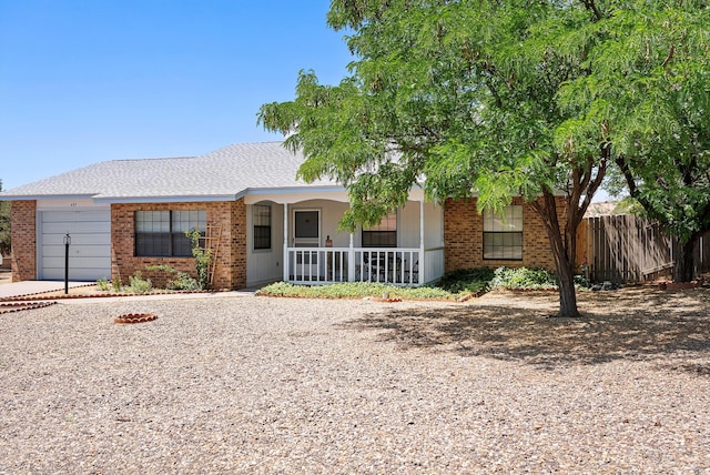 437 7th Ave NE, Rio Rancho, NM 87124 - view of front of house with a porch and brick siding