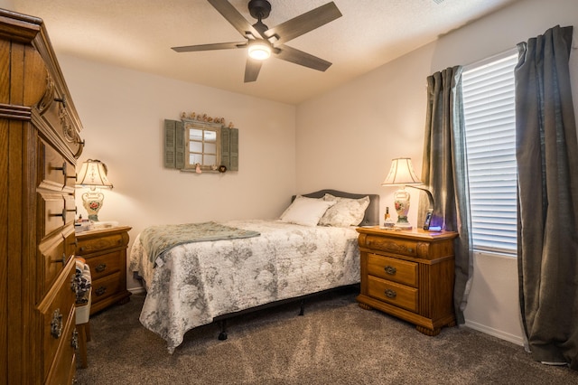 2336 Del Timbre Ln SW, Albuquerque, NM 87121 - bedroom with dark carpet, a ceiling fan, and baseboards