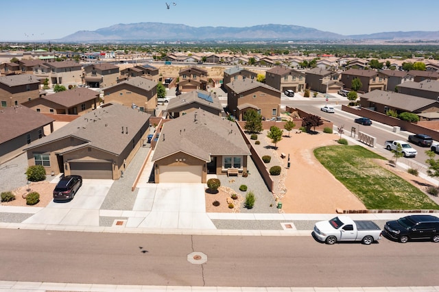 2336 Del Timbre Ln SW, Albuquerque, NM 87121 - aerial perspective of suburban area featuring a mountain backdrop
