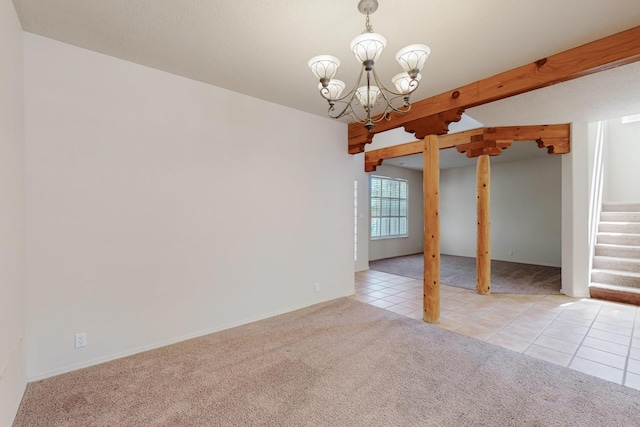 5124 Pyrite Pl NW, Albuquerque, NM 87114 - unfurnished room with carpet, tile patterned floors, a chandelier, stairs, and baseboards