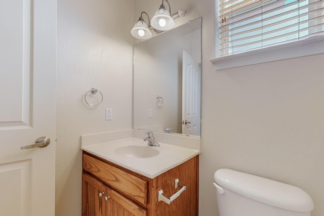 5124 Pyrite Pl NW, Albuquerque, NM 87114 - half bathroom with vanity and toilet