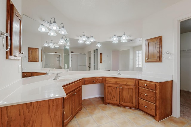 5124 Pyrite Pl NW, Albuquerque, NM 87114 - full bath with a stall shower, double vanity, and tile patterned floors