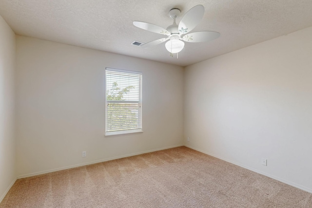 5124 Pyrite Pl NW, Albuquerque, NM 87114 - unfurnished room with carpet, a ceiling fan, baseboards, and a textured ceiling