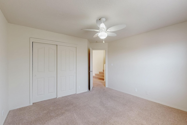 5124 Pyrite Pl NW, Albuquerque, NM 87114 - unfurnished bedroom with carpet, a closet, baseboards, and ceiling fan