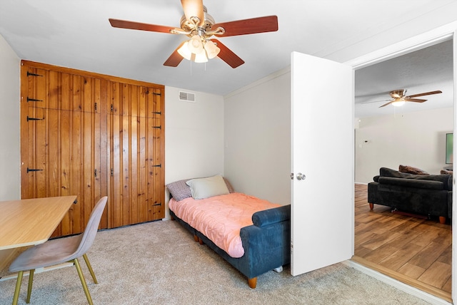 7609 Hannett Ave NE, Albuquerque, NM 87110 - bedroom featuring ceiling fan and carpet