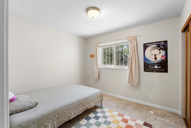 7609 Hannett Ave NE, Albuquerque, NM 87110 - carpeted bedroom with baseboards