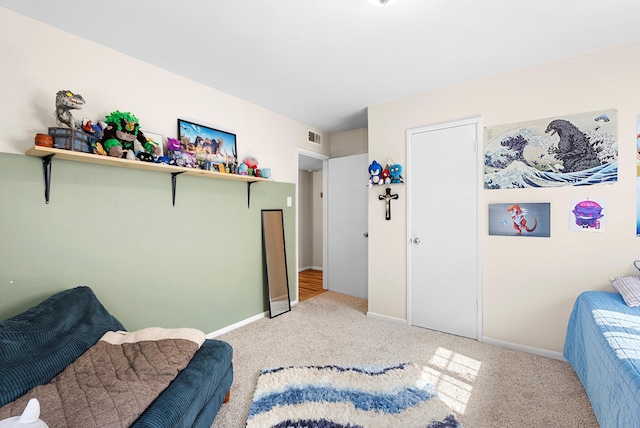 7609 Hannett Ave NE, Albuquerque, NM 87110 - carpeted bedroom featuring baseboards