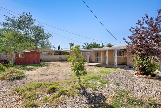 7609 Hannett Ave NE, Albuquerque, NM 87110 - view of yard with a patio and french doors