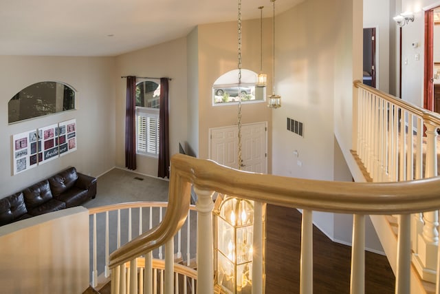 8215 Corona Ave NE, Albuquerque, NM 87122 - foyer featuring a chandelier and wood finished floors