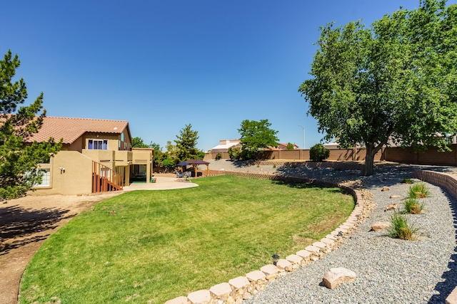 8215 Corona Ave NE, Albuquerque, NM 87122 - view of yard with stairway and a patio area