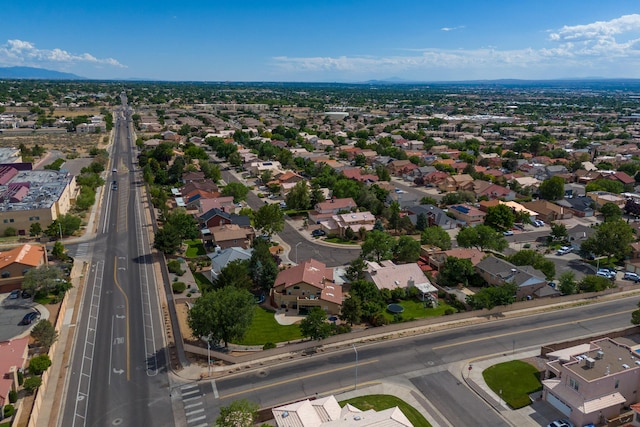8215 Corona Ave NE, Albuquerque, NM 87122 - aerial perspective of suburban area featuring a major roadway