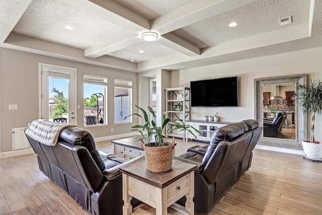 6240 Redroot St, Albuquerque, NM 87120 - living room featuring a textured ceiling, light wood-style floors, baseboards, beamed ceiling, and coffered ceiling