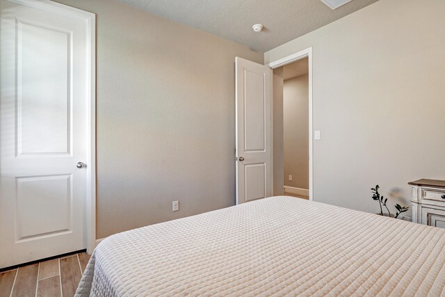6240 Redroot St, Albuquerque, NM 87120 - bedroom with wood finished floors and baseboards