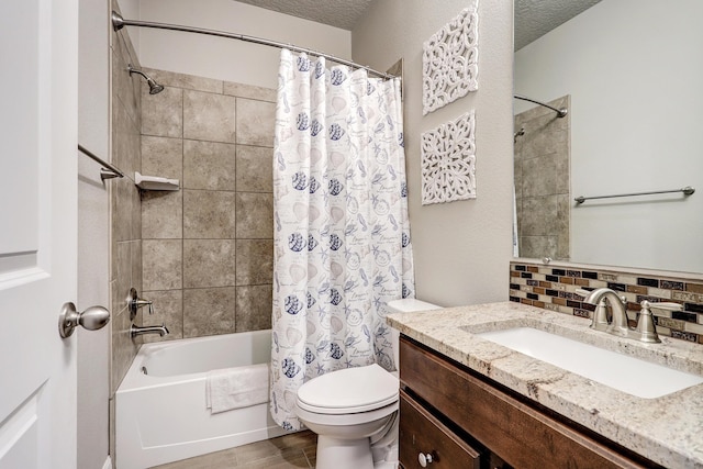 6240 Redroot St, Albuquerque, NM 87120 - full bathroom featuring shower / bath combo with shower curtain, vanity, toilet, and backsplash