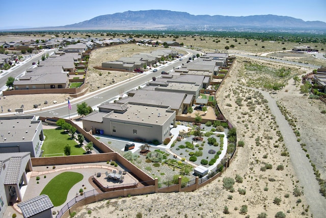 6240 Redroot St, Albuquerque, NM 87120 - aerial perspective of suburban area with a mountain backdrop