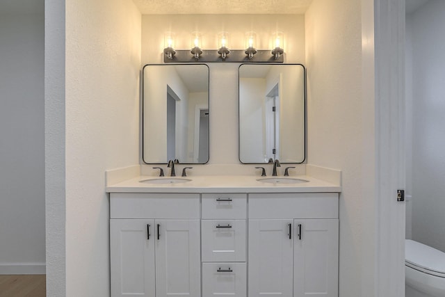 3217 Tennessee St NE, Albuquerque, NM 87110 - bathroom featuring toilet and double vanity