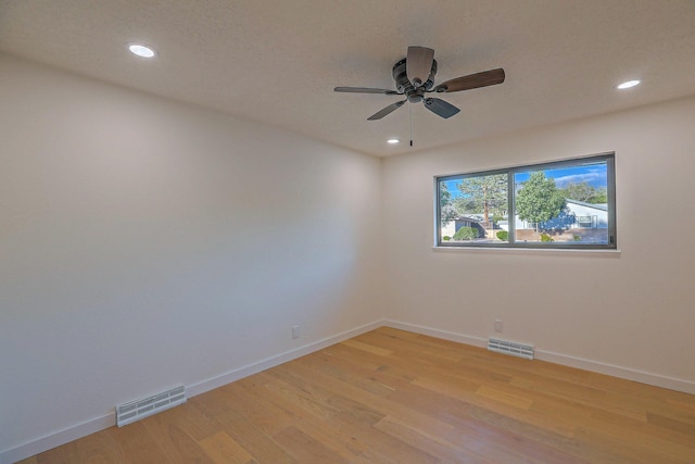 3217 Tennessee St NE, Albuquerque, NM 87110 - unfurnished room featuring baseboards, recessed lighting, light wood-type flooring, and ceiling fan