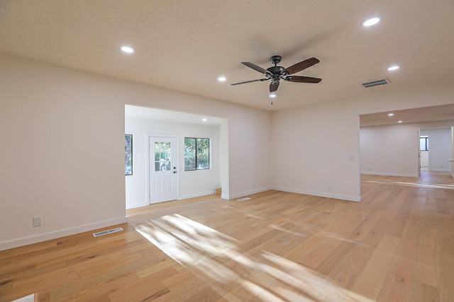 3217 Tennessee St NE, Albuquerque, NM 87110 - spare room featuring recessed lighting, light wood-style flooring, ceiling fan, and baseboards