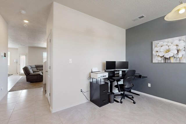 2317 Solara Loop NE, Rio Rancho, NM 87144 - office area with a textured ceiling and light tile patterned flooring