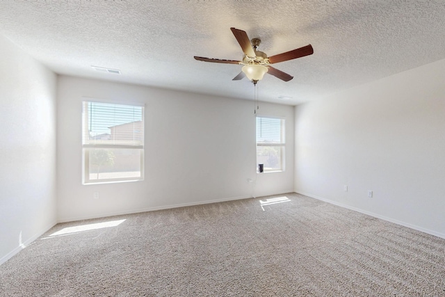 2317 Solara Loop NE, Rio Rancho, NM 87144 - carpeted spare room featuring ceiling fan and a textured ceiling