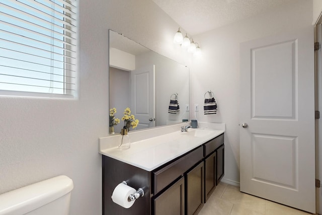 2317 Solara Loop NE, Rio Rancho, NM 87144 - half bathroom featuring vanity and tile patterned floors