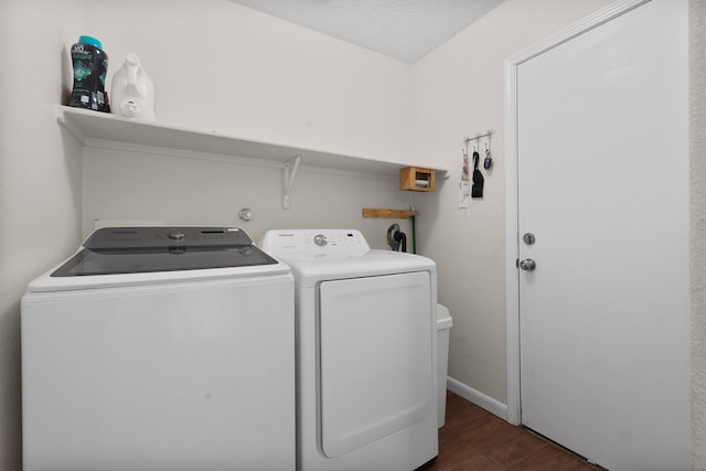 8331 Wild Dunes Ave NW, Albuquerque, NM 87120 - washroom with independent washer and dryer, dark wood-style flooring, and baseboards