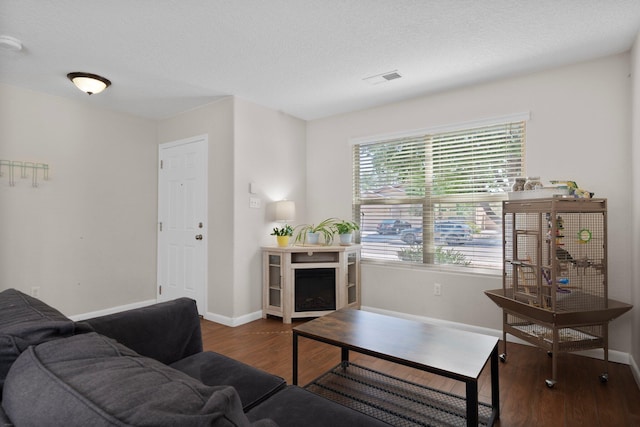 8331 Wild Dunes Ave NW, Albuquerque, NM 87120 - living room featuring wood finished floors and baseboards
