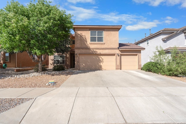 8331 Wild Dunes Ave NW, Albuquerque, NM 87120 - view of front facade with stucco siding, driveway, a garage, and an attached garage