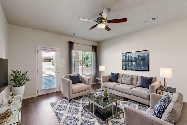 9624 Basalt Peak Dr NW, Albuquerque, NM 87114 - living room with ceiling fan, wood finished floors, and baseboards