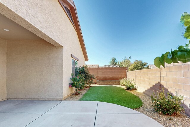 9624 Basalt Peak Dr NW, Albuquerque, NM 87114 - fenced backyard featuring a patio area