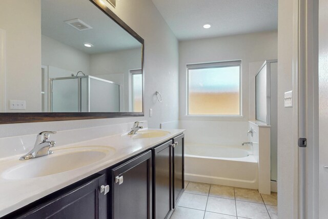 9624 Basalt Peak Dr NW, Albuquerque, NM 87114 - bathroom with a bath, tile patterned flooring, double vanity, and a shower stall