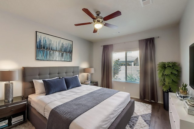 9624 Basalt Peak Dr NW, Albuquerque, NM 87114 - bedroom with wood finished floors, baseboards, and a ceiling fan