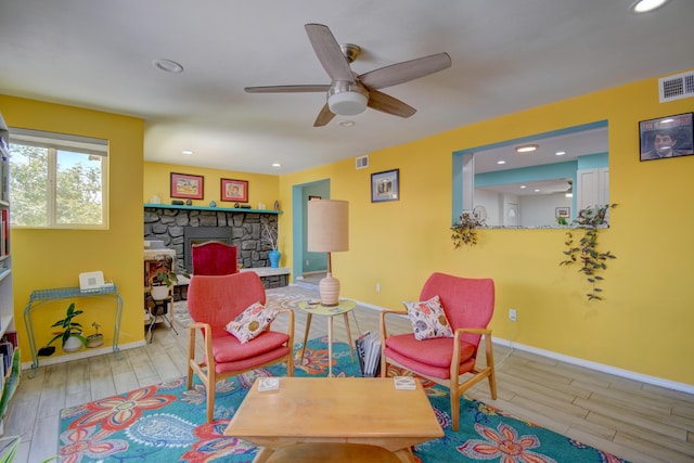 10008 Propps St NE, Albuquerque, NM 87112 - living area featuring wood finished floors, ceiling fan, baseboards, and recessed lighting