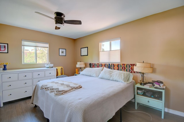 10008 Propps St NE, Albuquerque, NM 87112 - bedroom featuring dark wood-type flooring, ceiling fan, and baseboards
