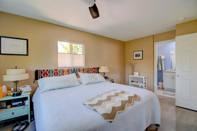 10008 Propps St NE, Albuquerque, NM 87112 - bedroom with wood finished floors and ensuite bath