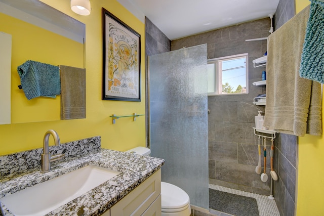 10008 Propps St NE, Albuquerque, NM 87112 - bathroom featuring toilet, vanity, and a walk in shower