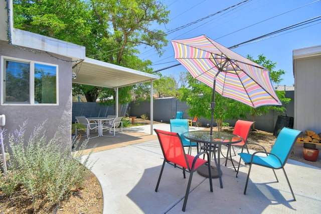 10008 Propps St NE, Albuquerque, NM 87112 - fenced backyard with outdoor dining area and a patio area