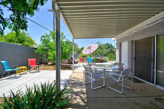 10008 Propps St NE, Albuquerque, NM 87112 - fenced backyard featuring outdoor dining area and a patio area