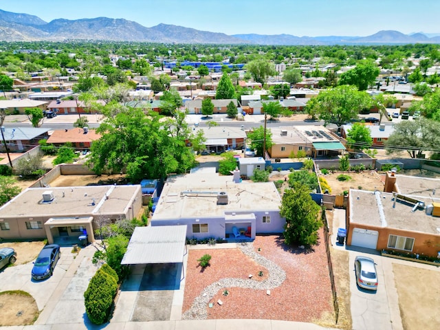 10008 Propps St NE, Albuquerque, NM 87112 - aerial perspective of suburban area with a mountain backdrop