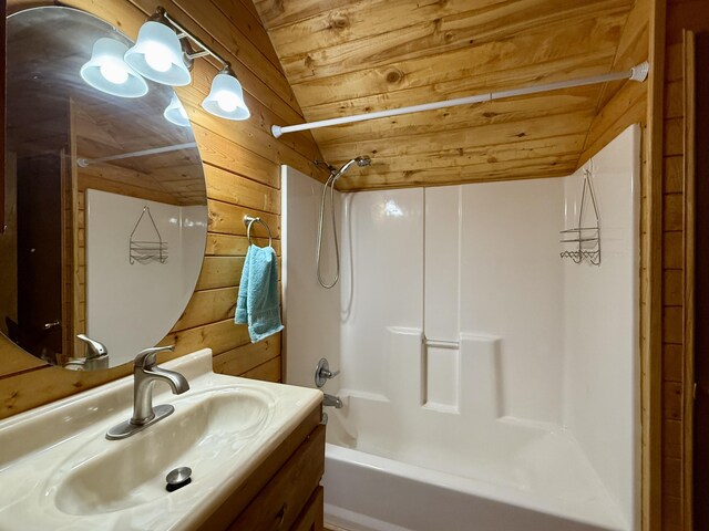 31 Smokey Bear Rd, Ramah, NM 87321 - full bathroom featuring wooden ceiling, washtub / shower combination, wood walls, and vanity